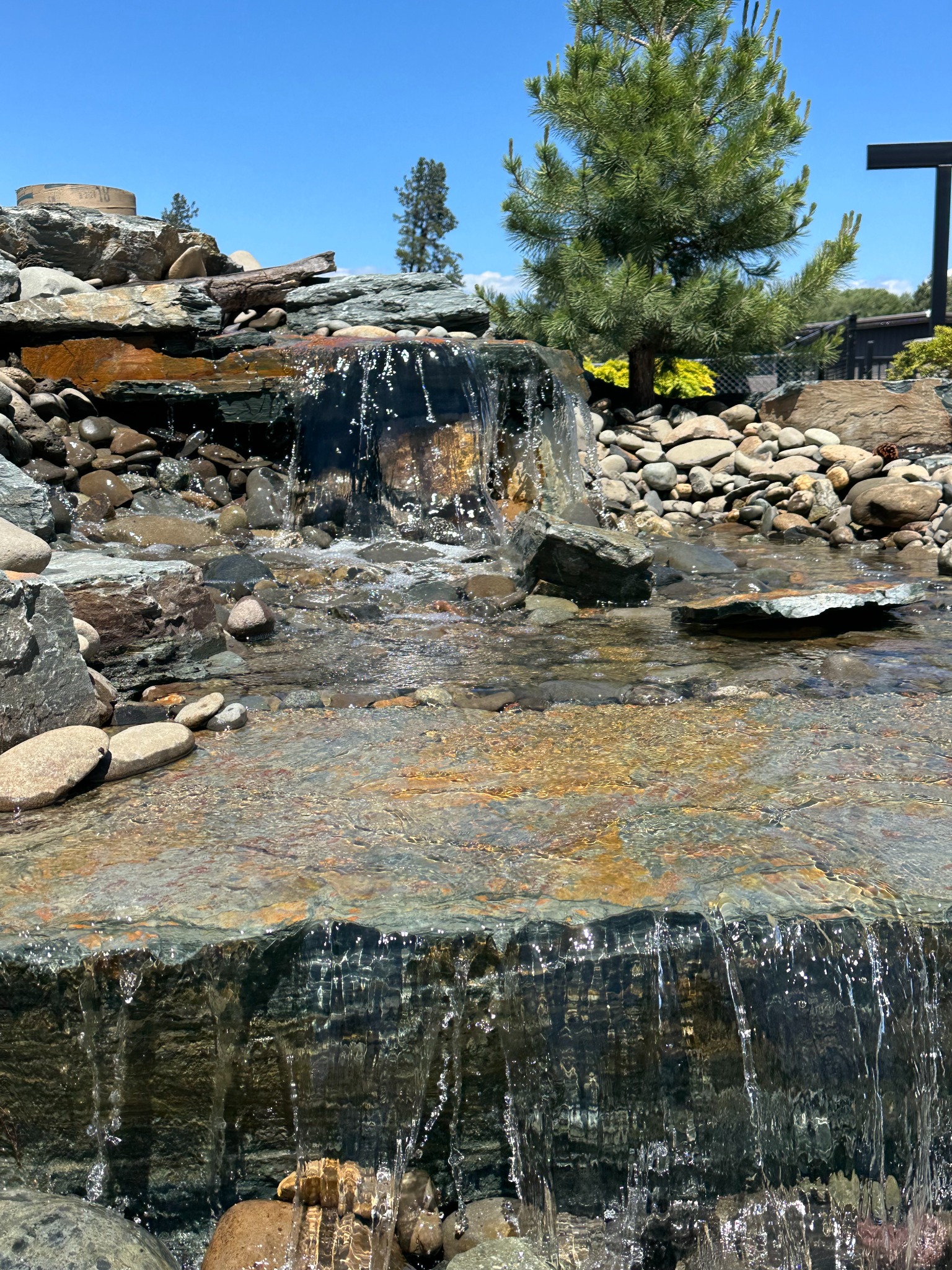 Onyx natural waterfall and rock water feature